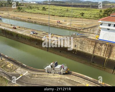 Water lock with a small vehicle on rails along the canal, panama city, panamakanl, panama, Central America Stock Photo