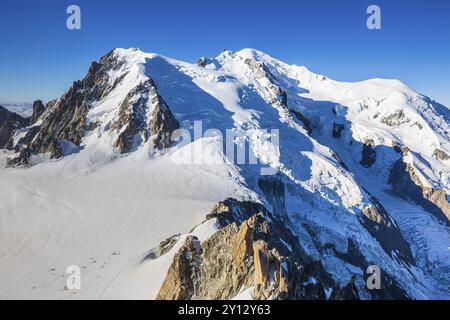 Mountain peak with glacier in sunshine, view from Aiguille du Midi to Mont Blanc, Mont Blanc massif, French Alps, Chamonix, France, Europe Stock Photo