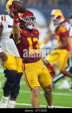 USC Trojans linebacker Mason Cobb (13) celebrates after intercepting a pass in the closing seconds during an NCAA football game against the LSU Tigers Stock Photo