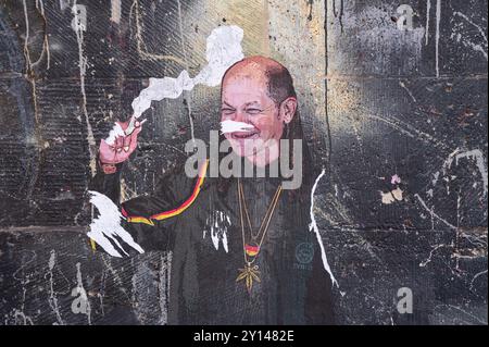 17.05.2024, Berlin, Germany, Europe - A mural depicts German chancellor Olaf Scholz as pothead on a building wall in the new city quarter Am Tacheles. Stock Photo