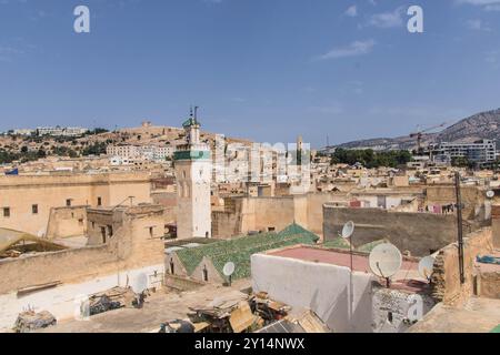 aerial view of the Medina with university and al karaouinemosque green roof and minaret at Fes, Morocco Stock Photo
