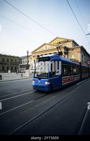 Germany, Munich, city tram and opera house. Stock Photo