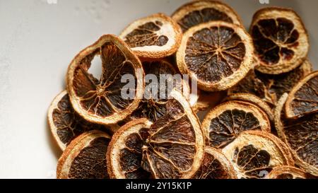 Closeup of dried orange slices showcasing intricate texture and natural color details Stock Photo