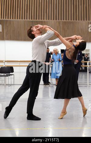 Aaron S. Watkin, Artistic Director and Queen Camilla, Patron of English National Ballet watch rehearsals at the English National Ballet's Mulryan Centre for Dance in east London. This is the Queen's first official visit to the English National Ballet since being made its patron earlier this year. Picture date: Thursday September 5, 2024. Stock Photo