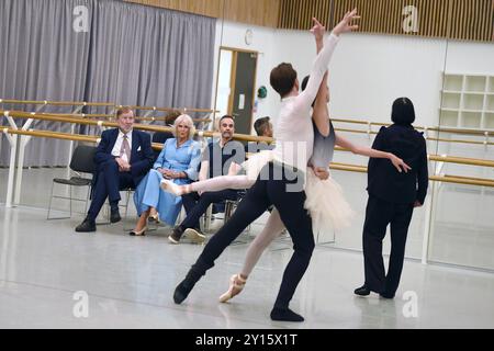 Sir Rupert Gavin, Chair, English National Ballet, Queen Camilla, Patron of English National Ballet and Aaron S. Watkin (right), Artistic Director watch rehearsals at the English National Ballet's Mulryan Centre for Dance in east London. This is the Queen's first official visit to the English National Ballet since being made its patron earlier this year. Picture date: Thursday September 5, 2024. Stock Photo