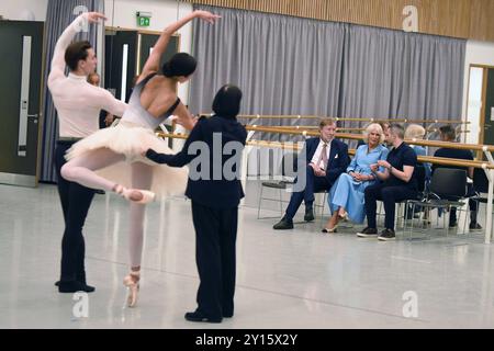 Sir Rupert Gavin, Chair, English National Ballet, Queen Camilla, Patron of English National Ballet and Aaron S. Watkin (right), Artistic Director watch rehearsals at the English National Ballet's Mulryan Centre for Dance in east London. This is the Queen's first official visit to the English National Ballet since being made its patron earlier this year. Picture date: Thursday September 5, 2024. Stock Photo