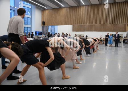 Aaron S. Watkin, Artistic Director, Queen Camilla, Patron of English National Ballet and Sir Rupert Gavin (right), Chair, English National Ballet, watch rehearsals at the English National Ballet's Mulryan Centre for Dance in east London. This is the Queen's first official visit to the English National Ballet since being made its patron earlier this year. Picture date: Thursday September 5, 2024. Stock Photo