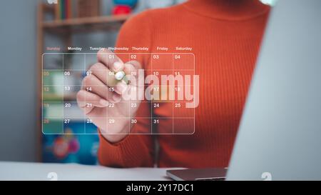 Business woman marking dates on virtual calendar, Managing his business schedule, Setting reminders for important appointments, creative collage for p Stock Photo
