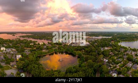 Aerial panoramic photograph of Maitland, Florida, USA. May 29, 2022. Overcast sunset with colorful sky. North of downtown Orlando, FL. Stock Photo