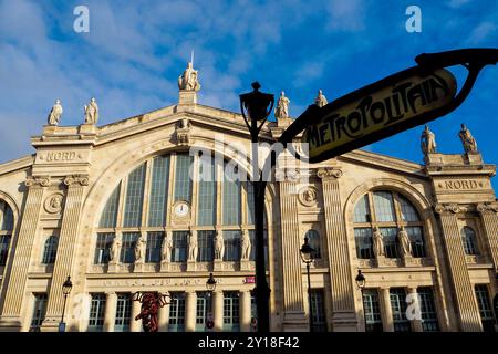 Paris, France. November 14, 2016. Facade of the Gare du Nord train station with Metropolitain sign Stock Photo