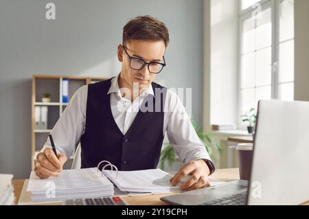 Focused Businessman Accountant Working In Office Stock Photo