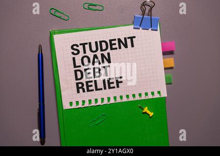 Student loan debt, text words typography written on paper, life and educational concept. Stock Photo