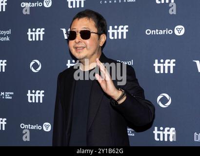 Toronto, Canada. 5th Sep, 2024. Chinese director Jia Zhangke poses for photos as he attends the North American premiere of the film 'Caught by the Tides' during the 2024 Toronto International Film Festival in Toronto, Canada, Sept. 5, 2024. Credit: Zou Zheng/Xinhua/Alamy Live News Stock Photo