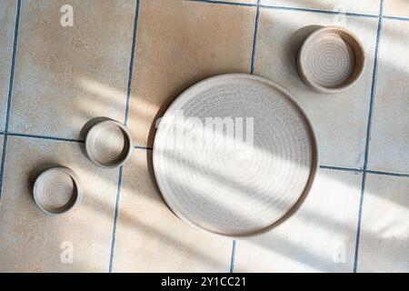 Minimalistic table setting with ceramic tableware Stock Photo