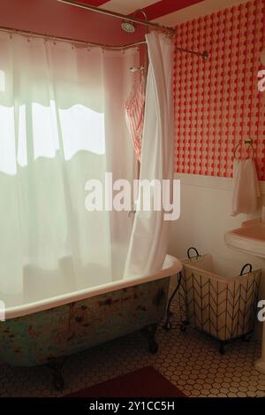 Vintage-style bathroom with a clawfoot tub Stock Photo