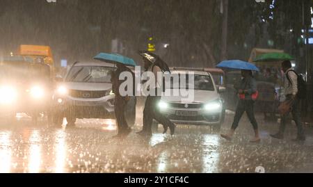 New Delhi, India. 06th Sep, 2024. NEW DELHI, INDIA - SEPTEMBER 5: People walking under the dark Cloud during the heavy Rain at Connaught place, on September 5, 2024 in New Delhi, India. (Photo by Raj K Raj/Hindustan Times/Sipa USA ) Credit: Sipa USA/Alamy Live News Stock Photo