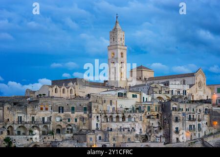 Matera ancient city view with cathedral at sunset, in Italy Stock Photo