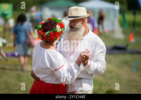 Belarus, Avtyuki village, July 29, 2023. Celebration of ethnic Slavic cultures. People dance national dances. Belarusian culture. Slavic culture. Stock Photo
