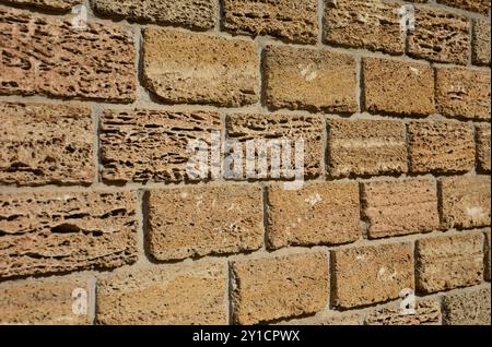 Limestone blocks textured background. Limestone blocks wall. Stock Photo