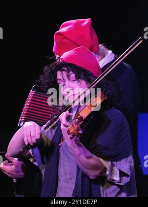 Music making by the cast in Roughcast Theatre's 2018 Christmas show a parody of the adventure The Scarlet Pimpernel set during the French Revolution. Stock Photo