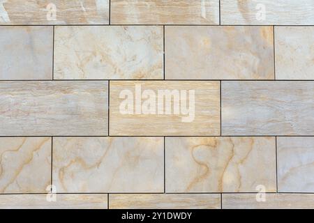 Background from a wall made of brown ceramic slabs Stock Photo