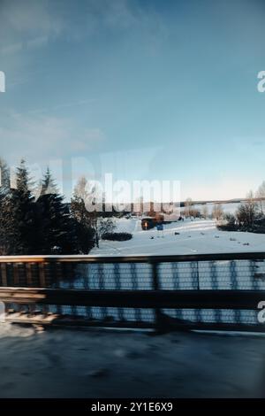 Small frozen lake shot from bus window in Rovaniemi, Lapland Stock Photo