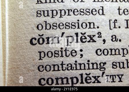 Word complex on dictionary page, macro close-up Stock Photo