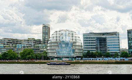 London, UK - July 24, 2024: The City Hall Building, on the south bank of the River Thames near Tower Bridge, was designed by Norman Foster Stock Photo