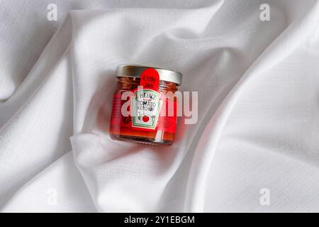 Kirkwall, Orkney, Scotland - July 15, 2024: Food service single serving jar of Heinz Tomato Ketchup Stock Photo