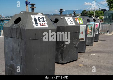 Geneva, Switzerland - July 28, 2024: Trash bins and recycle containers on the streets of Geneva Stock Photo