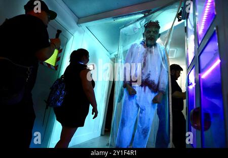 Los Angeles, USA. 5th Sep, 2024. Visitors take pictures during the Halloween Horror Nights 2024 opening night at Universal Studios Hollywood in Los Angeles, California, the United States, on Sept. 5, 2024. Universal Studios Hollywood in Los Angeles on Thursday kicked off its Halloween Horror Nights, an annual Halloween-themed event. Credit: Qiu Chen/Xinhua/Alamy Live News Stock Photo