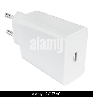 Power adapter for phone or tablet, on white background in insulation. Stock Photo