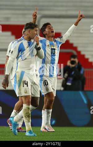 Argentina's forward Paulo Dybala (R) celebrates with teammates after scoring the team’s third goal against Chile during the South American qualification football match between Argentina and Chile for the FIFA World Cup 2026 at the Monumental stadium in Buenos Aires on September 5, 2024.  Argentina won by 3-0. Credit: Alejandro Pagni/Alamy Live News Stock Photo