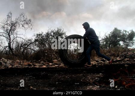 Clashes occur in the West Bank town of Kafr Qaddum between Israeli forces and Palestinians protesting against the extension of the nearby Israeli settlement of Kedumin and the separation wall Stock Photo