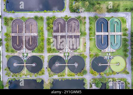 Top down drone shot of the sewage treatment plant.The Solid contact clarifier tank type sludge recirculation in water treatment plant. Industrial wast Stock Photo