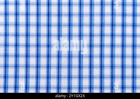 Checkered blue fabric. Textile. Checkered fabric background with blue and white cells Stock Photo
