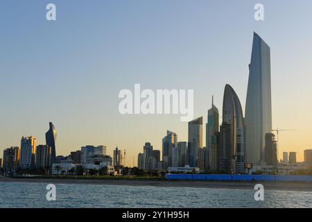 View from Kuwait City in a sunny day and sunset at the background. Stock Photo