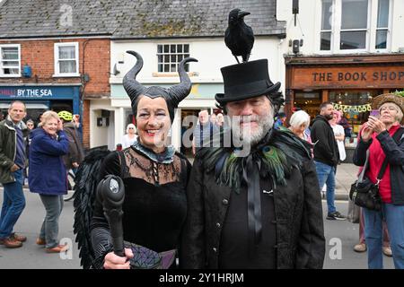 Bridport, Dorset, UK. 7th September 2024.  Hundreds of people wearing creatively decorated hats attend the annual Bridport Hat Festival at Bridport in Dorset.  Picture Credit: Graham Hunt/Alamy Live News Stock Photo