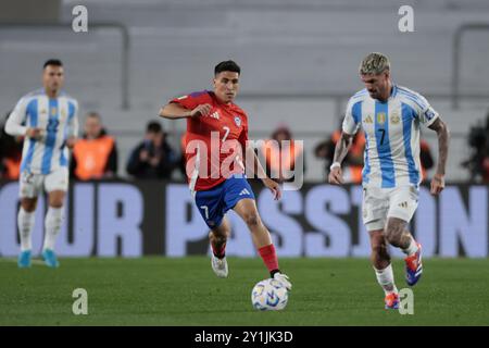 Buenos Aires, Argentina - September 5, 2024. Argentine midfielder Rodrigo De Paul (7) fights for the ball against Marcelino Nuñez (7) during the match Stock Photo