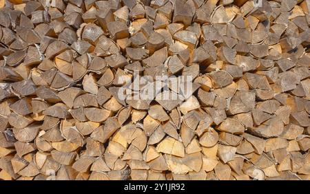 Chopped firewood, natural background or texture. Stock Photo