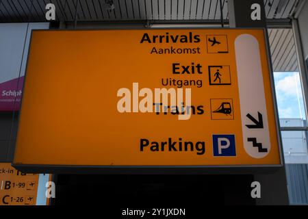 Direction Sign Before The Gates At Schiphol Airport The Netherlands 29-8-2024 Stock Photo