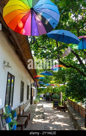 beautiful rustic old town of Szigliget with colorful umbrella decoration Stock Photo