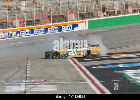 Hampton, Ga, USA. 7th Sep, 2024. NASCAR Xfinity Series driver, AUSTIN HILL (21), celebrates his win for the Focused Health 250 at Atlanta Motor Speedway in Hampton, GA. (Credit Image: © Walter G. Arce Sr./ASP via ZUMA Press Wire) EDITORIAL USAGE ONLY! Not for Commercial USAGE! Credit: ZUMA Press, Inc./Alamy Live News Stock Photo