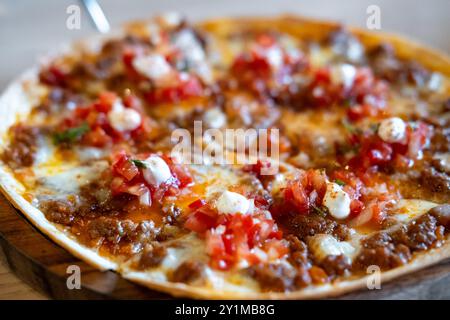 Nacho with minced meat and tomato salsa sauce Stock Photo