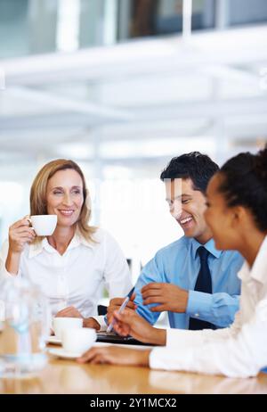 Business people, funny and planning in meeting, conversation and teamwork for project. Group, employees and coworkers with ideas, support and Stock Photo