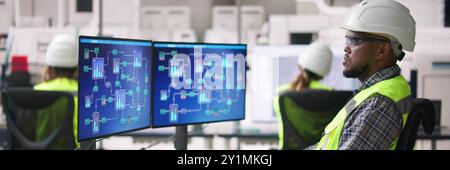 Engineer Operators Using Scada System At Industrial Plant Stock Photo