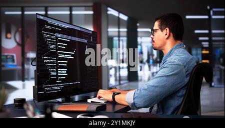 Web Developer Coding On Computer To Develop Code Stock Photo