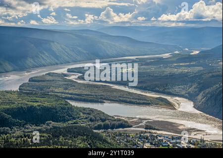 Evening overview of the Yukon River as seen from the Midnight Dome in Dawson City, Yukon, Canada Stock Photo