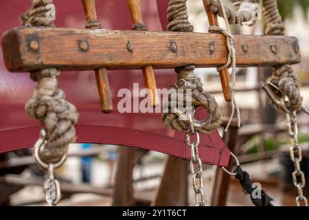 knotted ropes and rigging on an old sailing ship in nautical themed composition Stock Photo