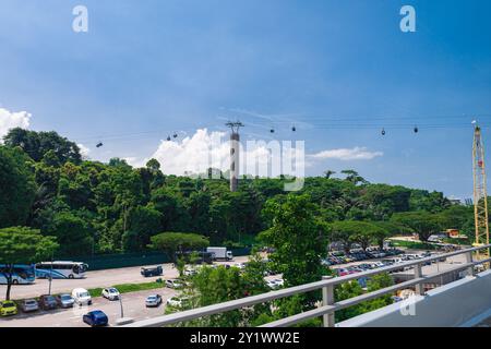 Singapore - Jun 13 2024: Sentosa Cable Car is a gondola lift providing an aerial link from Mount Faber to the resort island of Sentosa. Stock Photo